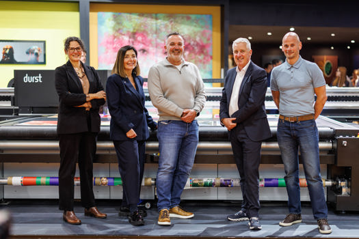 Innovate's Devitt (centre) and Broomfield (right) with the Durst team
