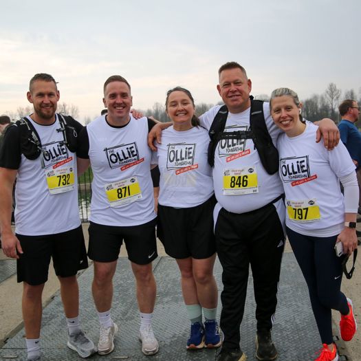 Lees (centre) completed a 10km race as part of her efforts to date