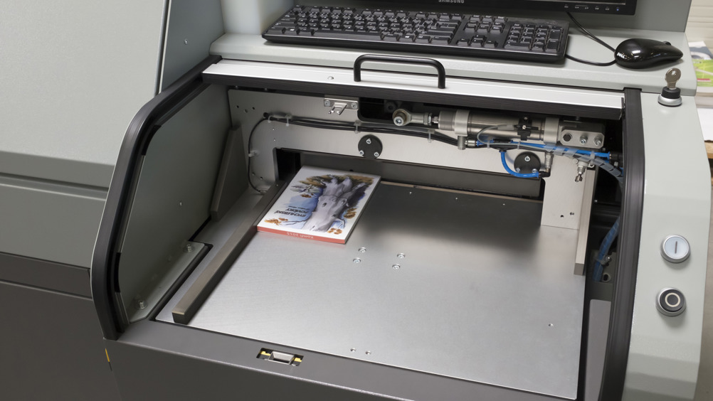 Printweek komfi launches book edge printing machine